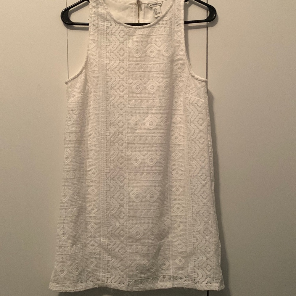 White lace sheath dress.